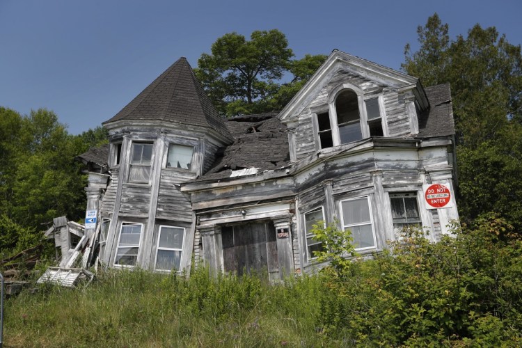 This condemned former home of a sea captain on Route 1 in Searsport is being dismantled, says its owner, just very slowly. The town asked Doug Brown two years ago to tear it down. The house was built in the 1860s by Capt. Joseph Loomis Park.