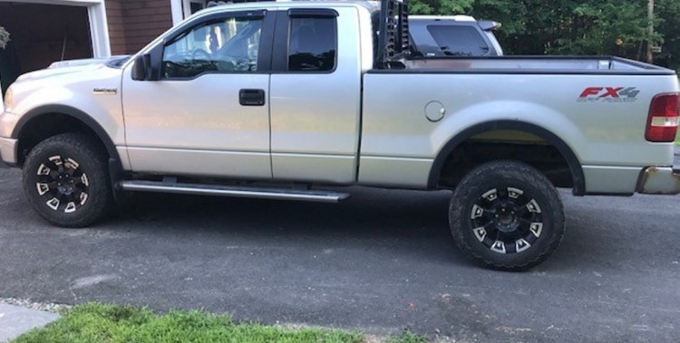 The driver of this silver Ford truck is accused of spinning its wheels in a farmer's field doing about $5,000 worth of damage recently.