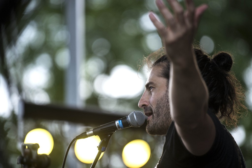 Adam Ezra, of the Adam Ezra Group, welcomes the hundreds in attendance Friday to the kickoff concert of the Waterville Rocks! summer concert series at Castonguay Square in downtown Waterville.