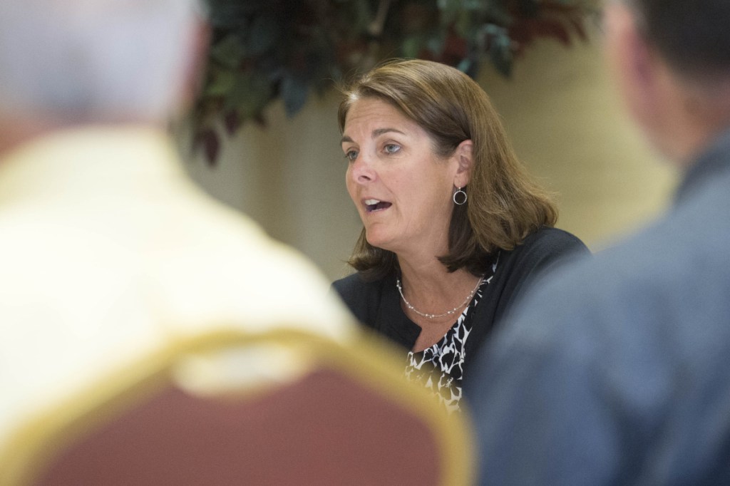 Heather Johnson, director of ConnectME, talks on Thursday about how community leaders can prepare to apply for grant money to help fund broadband expansion in rural areas at a Broadband Community Meeting at the Comfort Inn in Wilton. The discussion focused on the state's Broadband Action Plan, available planning grants, how to gauge community readiness, and funding mechanisms for broadband projects.
