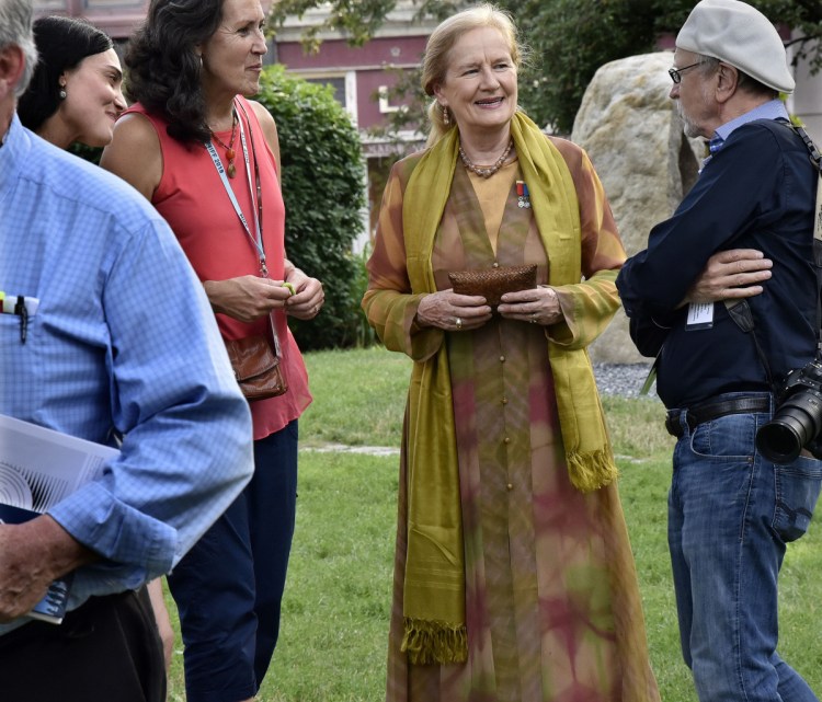 Actress Dominique Sanda, center, arrives at the Waterville Opera House where she was awarded the Maine International Film Festival Lifetime Achievement award after a viewing of her film "The Garden of the Finzi-Continis" on Sunday. Accompanying Sanda from left are Florencia Arruabarrena, Arlene King-Lovelace of MIFF and Chuck Robinson.