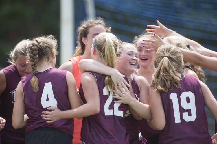 Staff photo by Michael G. Seamans 
 Freeport High School celebrates an overtime shoot-out win over Mt. Blue in the semifinals at the Western Mountain 7x7 Soccer Classic on Saturday in Strong.