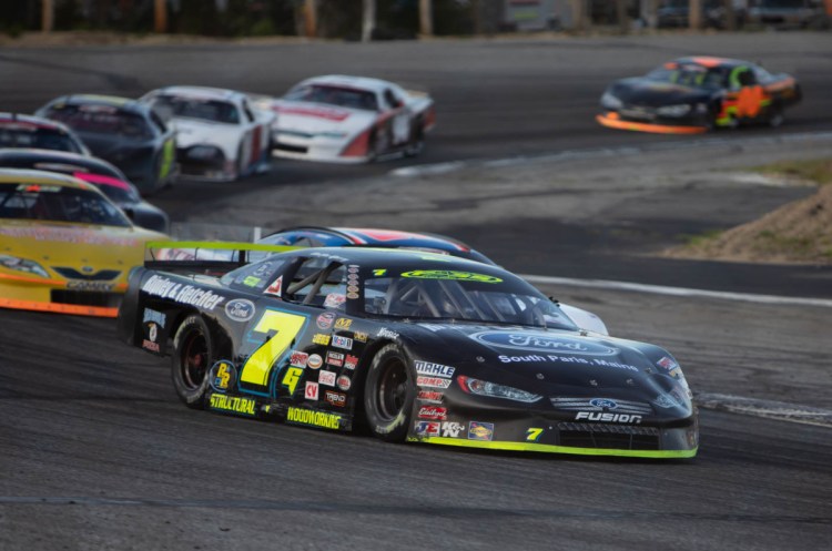 Curtis Gerry (7) rounds the corner during the PASS 150 on Sunday at Oxford Plains Speedway.