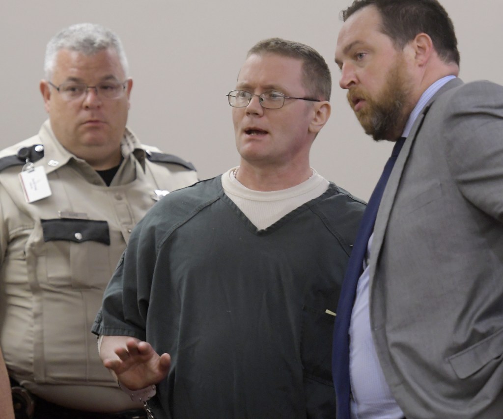 Michael Sean McQuade confers Monday with his attorney, Andrew Wright, during his Augusta sentencing for felony murder and robbery in the 2015 bludgeoning death of Joseph Marceau in Augusta.