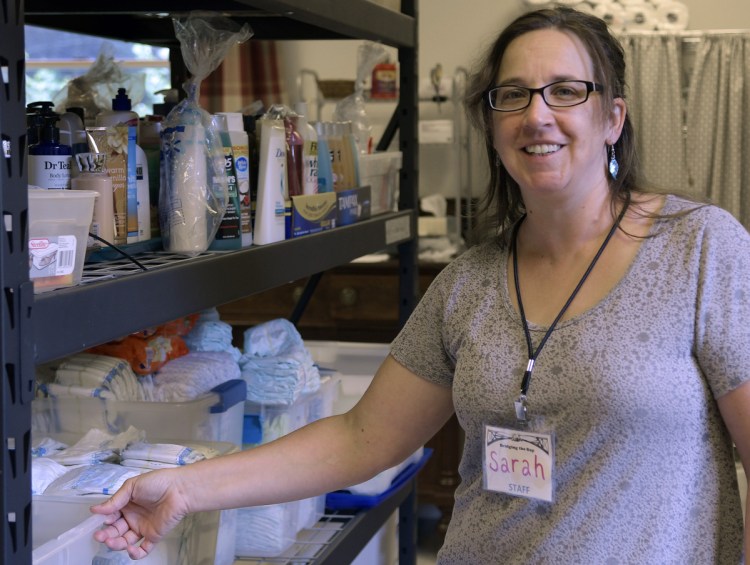 Sarah Miller, pictured here Thursday, is director of Bridging the Gap, the Augusta nonprofit organization that oversees the Addie's Attic clothing bank, the Everyday Essentials toiletries pantry and, in the winter, the Augusta Community Warming Center.