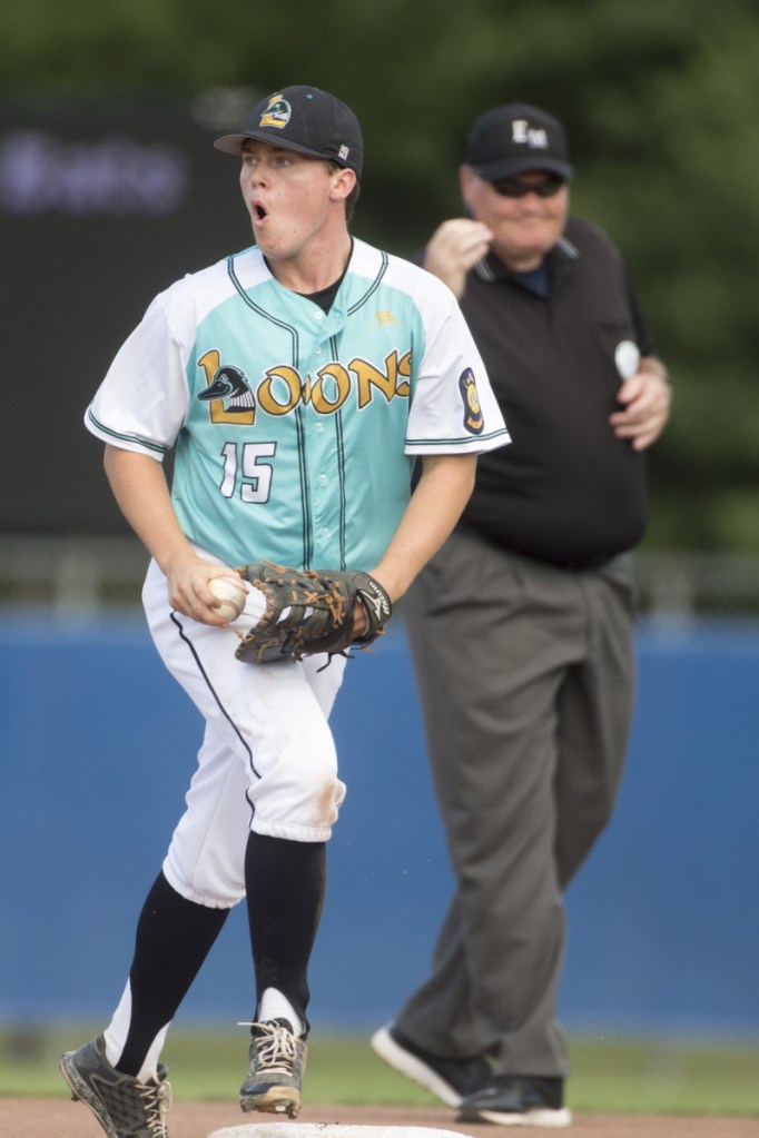 Staff photo by Michael G. Seamans 
 Messalonskee's Ben Hellen celebrates after turning a double play against Hampden in the Junior American Legion State Tournament on Tuesday at Mansfield Stadium in Bangor.