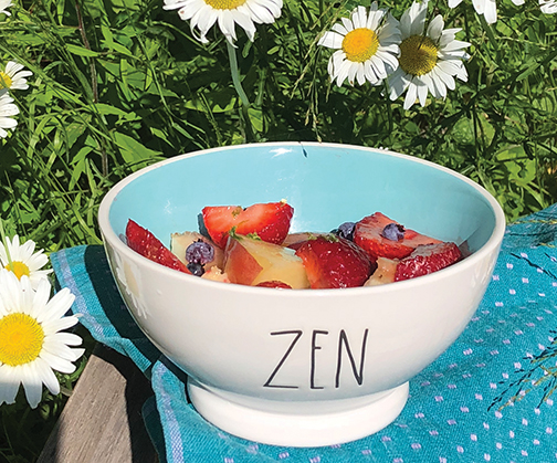 A selection of your favorite fresh, local fruits in season, some honey and a lime are all you need for a healthy, yummy dessert (or breakfast indulgence!) Served up in a pretty bowl, bites of seasonal fruit get a punch from a drizzle of tart/sweet dressing.  Nancy McGinnis photo