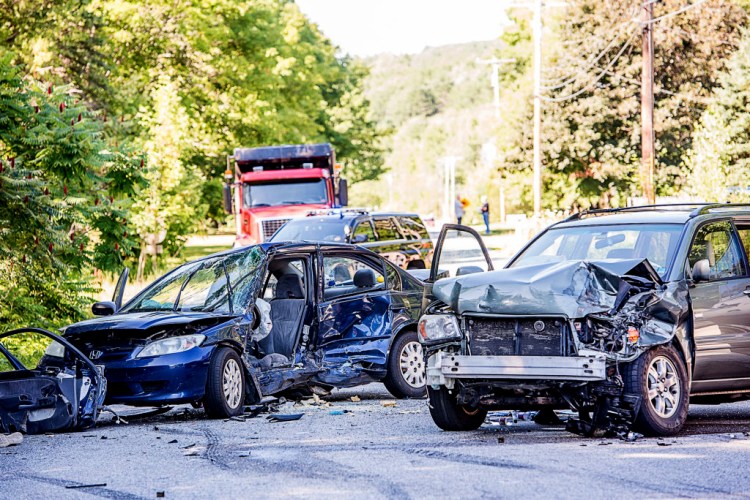 Emergency personnel respond to a serious accident at the corner of North Main and Bucknam streets in Mechanic Falls on Wednesday afternoon. 