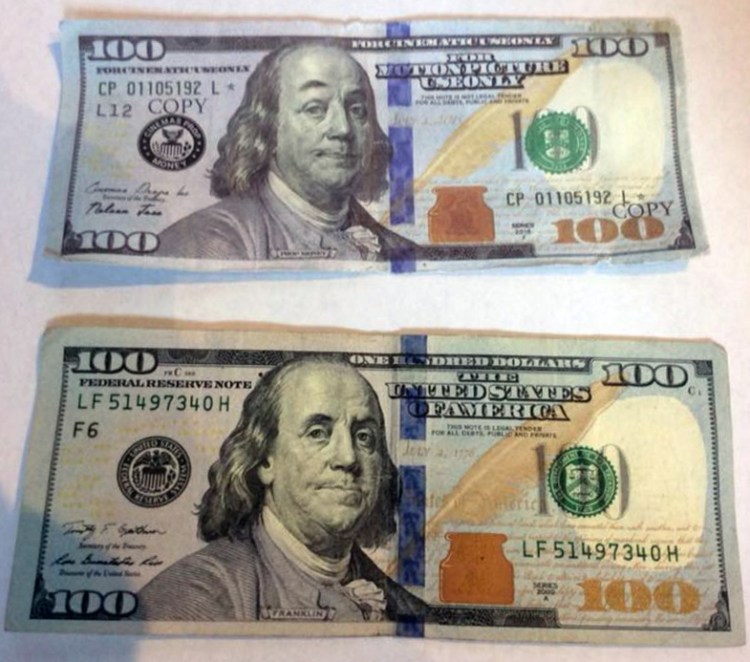 A fake $100 bill that was used by a man to buy beer Friday evening at Boynton's Market in Hallowell is under investigation by city police.