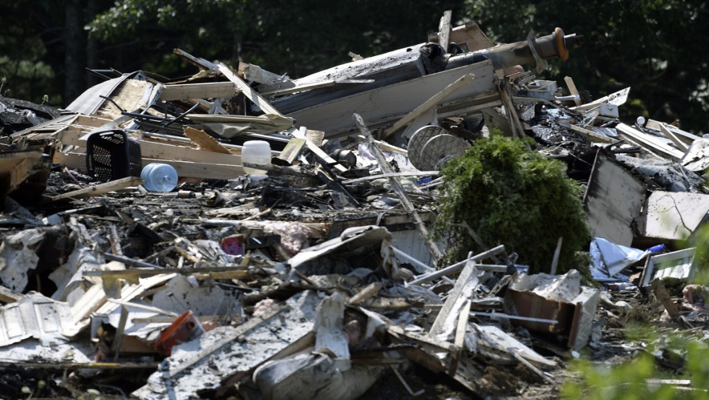 A heap of rubble is all that remains Wednesday of a residence that was destroyed Tuesday night by fire on Hunts Meadow Road in Whitefield.