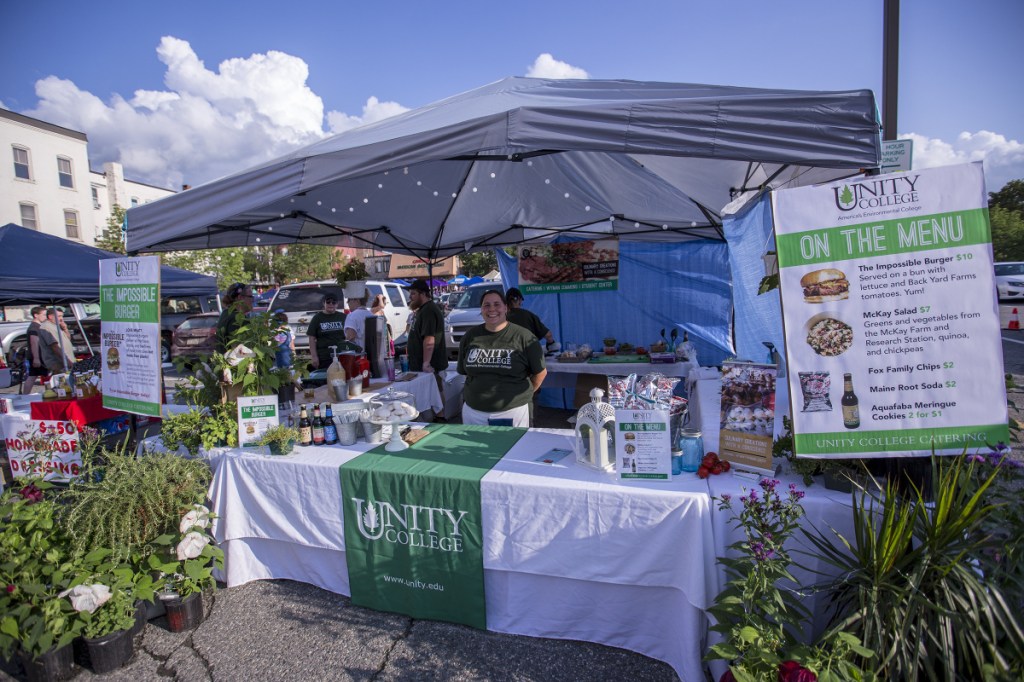 Unity College, the first institution of higher education in the country to divest its fossil fuel investments, was at the Taste for the first time, touting the plant-based Impossible Burger created by Impossible Foods of California and challenging festival-goers to see if they could detect the difference between the Impossible Burger and one made with meat.