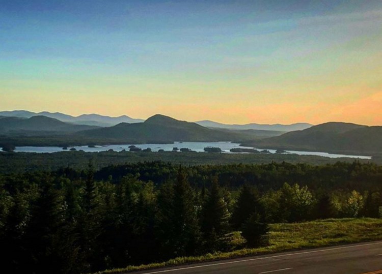 The view of mountains from a scenic overlook just outside of Jackman, as it looked in June.