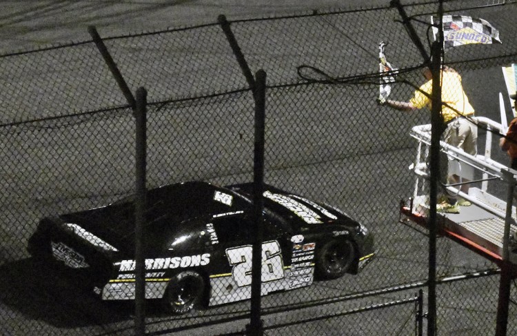 Bubba Pollard crosses the finish line at the Oxford 250 on Sunday at Oxford Plains Speedway.