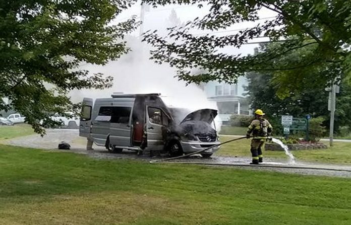 Augusta firefighters respond to a motor home fire in Savage Park on Monday morning. Two people and two dogs were in the vehicle, but none of them were injured in the blaze.