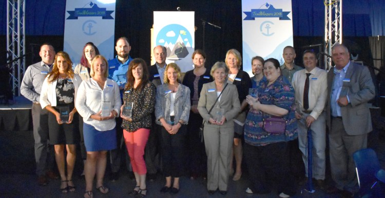 Fifteen outstanding employees received awards for their impressive commitment to Camden National Bank, customers, employees, shareholders and the community. In front from left are Angela Arbour, Amanda Smith, Tammy Sargent, Bonnie Blohm, Kim Cullen and Kate Donohue. In back from left are Chris Winters, Marie Cudmore, Chris Abbott, President and CEO Greg Dufour, Terri Tooley, Lisa Masters, Hannah Roy, Barry King, Nat Bell and John Everett.