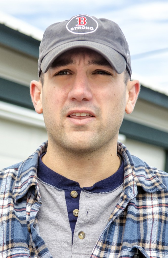 Patrick Drake talks about taking a test at an amateur radio festival Saturday at the Windsor Fairgrounds in Windsor.