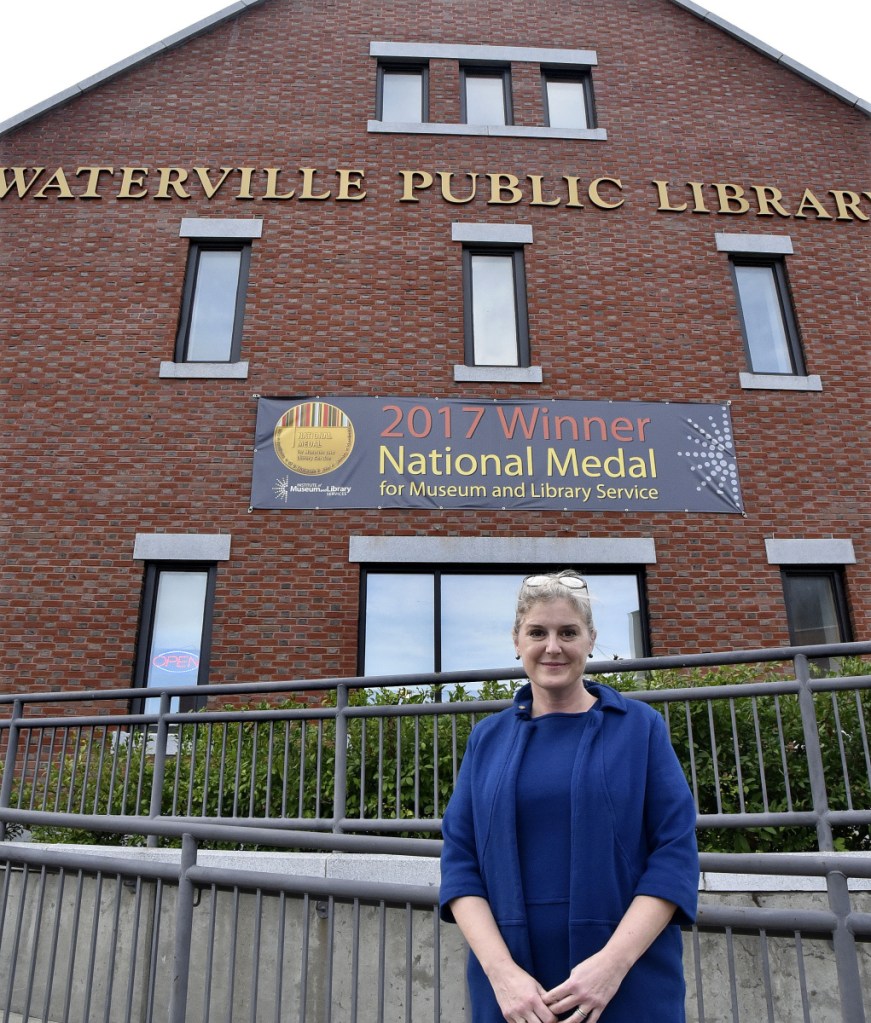 Sarah Sugden, director of the Waterville Public Library for nearly 14 years, stands outside the library Wednesday after announcing that she has accepted a position with the Brown County Library System in Green Bay, Wis.