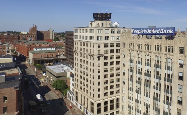 Tenants have said they regard the sale of the Time & Temperature Building as a positive development. They say they hope the buyer will invest in renovations.