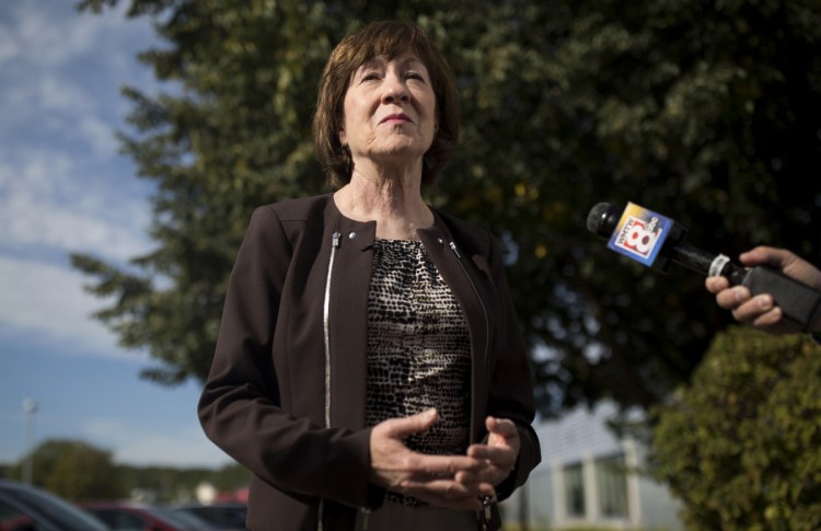 Sen. Susan Collins speaks with members of the press about Brett Kavanaugh's Supreme Court nomination after a tour of the healthcare company Abbott Laboratories in Scarborough.