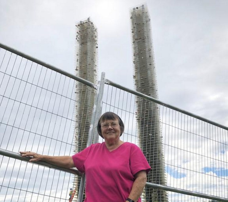 Chris Chapman of Harpswell, a retired Mt. Ararat High School visual arts teacher, was instrumental in the installation of a memorial to the lives lost in the Sept. 11, 2001, terrorist attacks. The two pillars, which represent the World Trade Center's Twin Towers, stand on the Topsham campus, near the fenced-off construction site of a new high school.