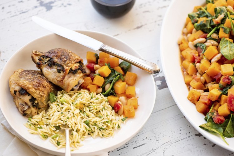 Spinach- and feta-stuffed chicken thighs.