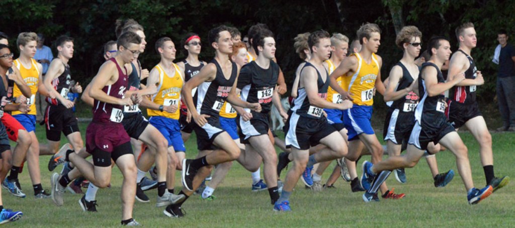The boys head out at the start of a cross country meet at the University of Maine in Augusta.