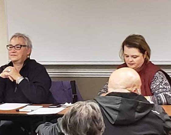 Maine Lobster Festival Board President Cynthia Powell listens to a speaker at the Sept. 25 meeting.