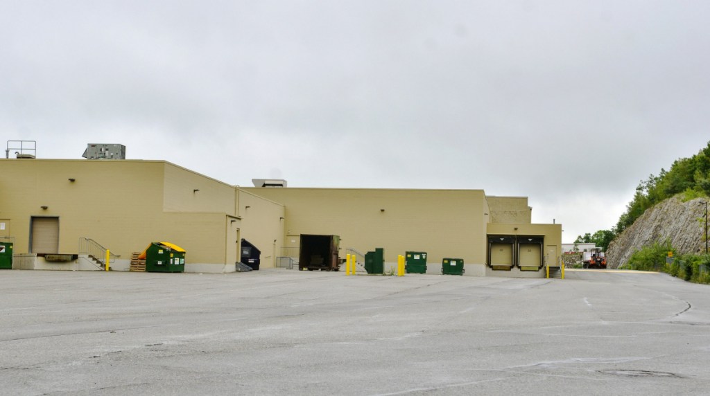 The loading docks behind Dressbarn and other stores in the Marketplace at Augusta are shown in this Aug. 14 photo. A proposal to allow brew pubs, bakeries, warehouses and light manufacturing at the otherwise retail-store-focused Marketplace is up for a City Council vote Thursday.