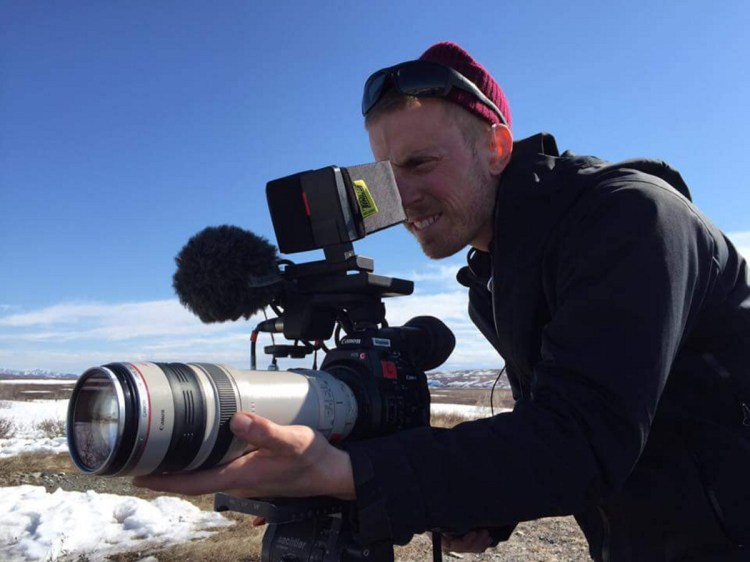 David Lovejoy, a 2006 Messalonskee High School graduate, takes aim on the set of "Life Below Zero," a BBC Worldwide production airing on the National Geographic Channel that is filmed in Alaska. Lovejoy was one of eight crew members to win an Emmy Award for Outstanding Cinematography for a Reality Program for his work on the show.