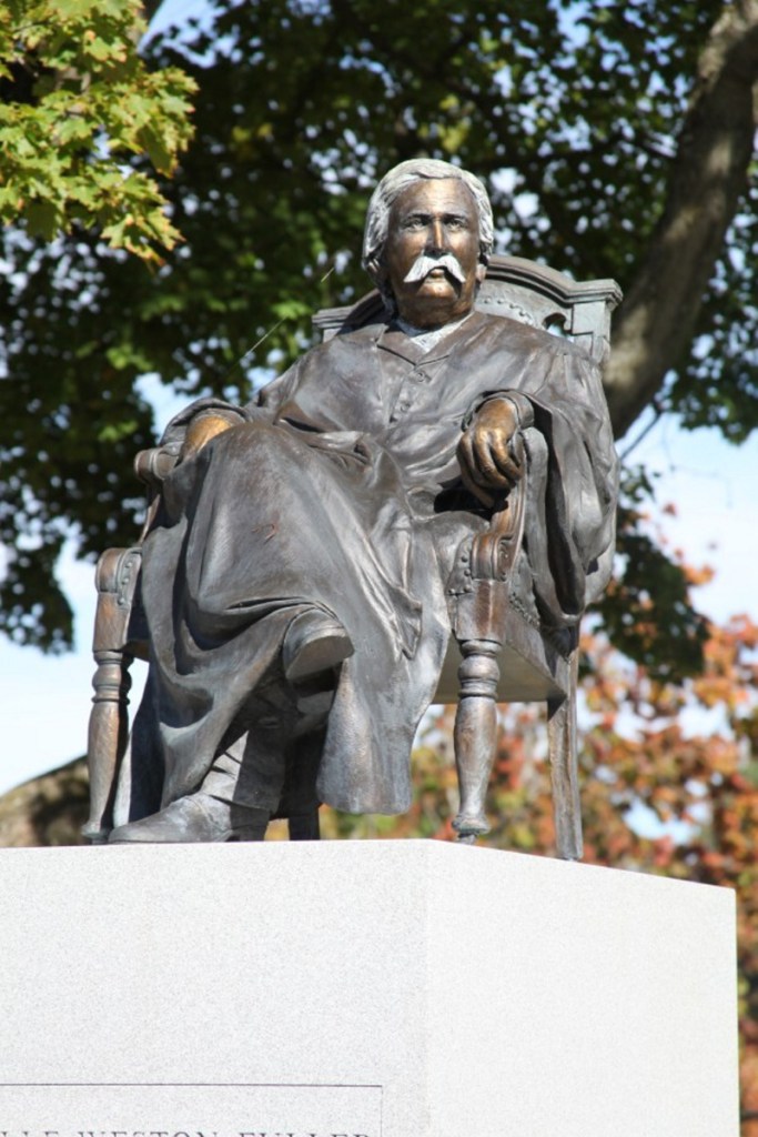 A statue depicting Melville Weston Fuller (1833-1910) gazes out over State Street traffic Saturday on the lawn in front of the Kennebec County Courthouse. Fuller was sworn in as U.S. Supreme Court chief justice 130 years ago Monday.