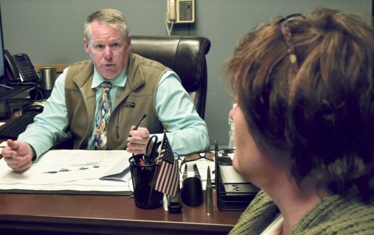 Skowhegan Police Chief David Bucknam speaks Tuesday about the new position of department chaplain that Pastor Jennifer Reed will assume after a five-week training at the Maine Criminal Justice Academy along with her male counterpart Pastor Mark Tanner.