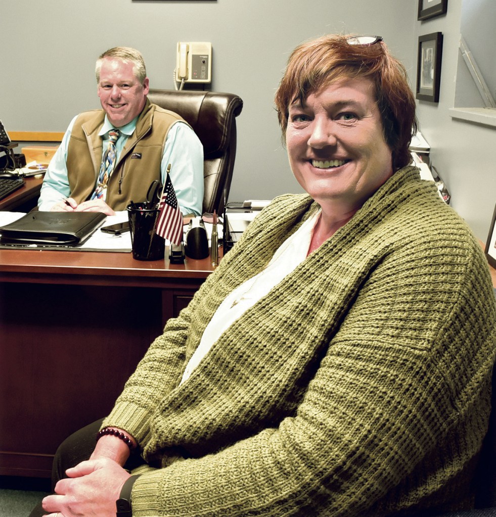Skowhegan Police Chief David Bucknam and new department chaplain Pastor Jennifer Reed on Tuesday. Reed will assume her new duties after a five-week training at the Maine Criminal Justice Academy along with her male counterpart Pastor Mark Tanner.