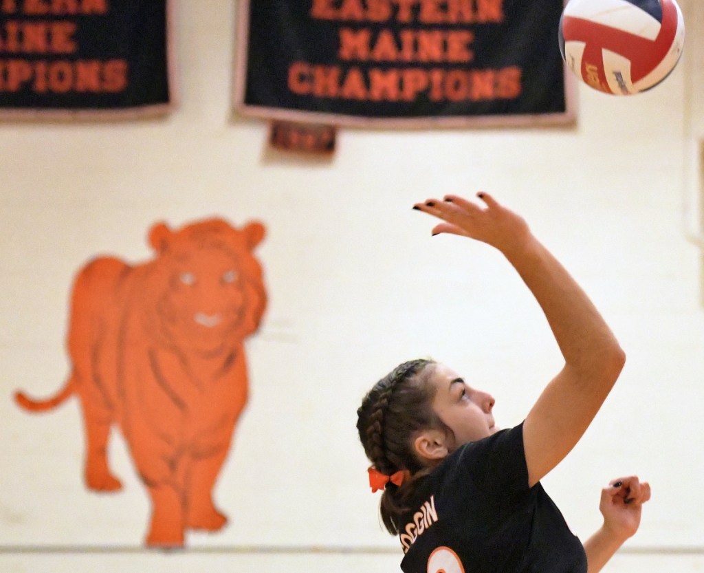 Gardiner's Kiara Goggin sends the ball over the next during a match Thursday in Gardiner.