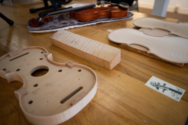 On display on the bottom floor of the Harlow Gallery, a cut away example of a violin sits on a table. Multiple Maine-based luthiers' work was on display from guitars to violins and cellos. The second annual Luthier Exhibition & Music Showcase took place in Hallowell this weekend.
