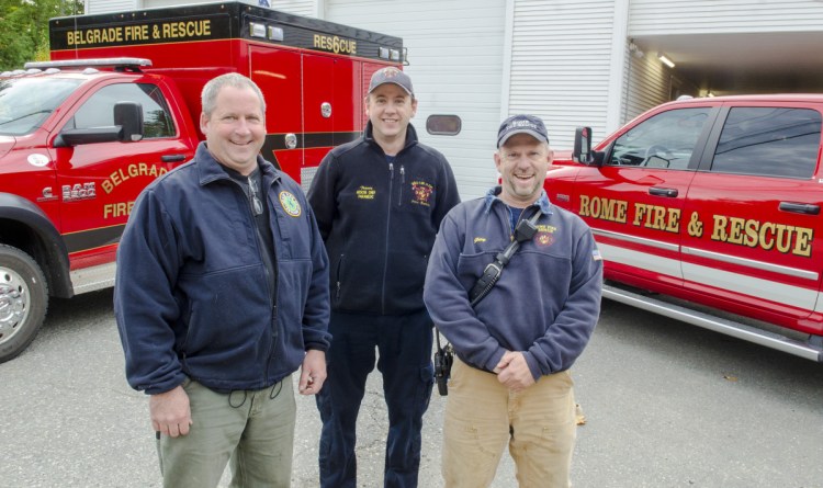 Belgrade Fire Chief Dan MacKenzie, left, Belgrade Rescue Chief Travis Burton and Rome Fire Chief Gary Foss gather on Monday at the Pulsifer Fire Station in Belgrade.