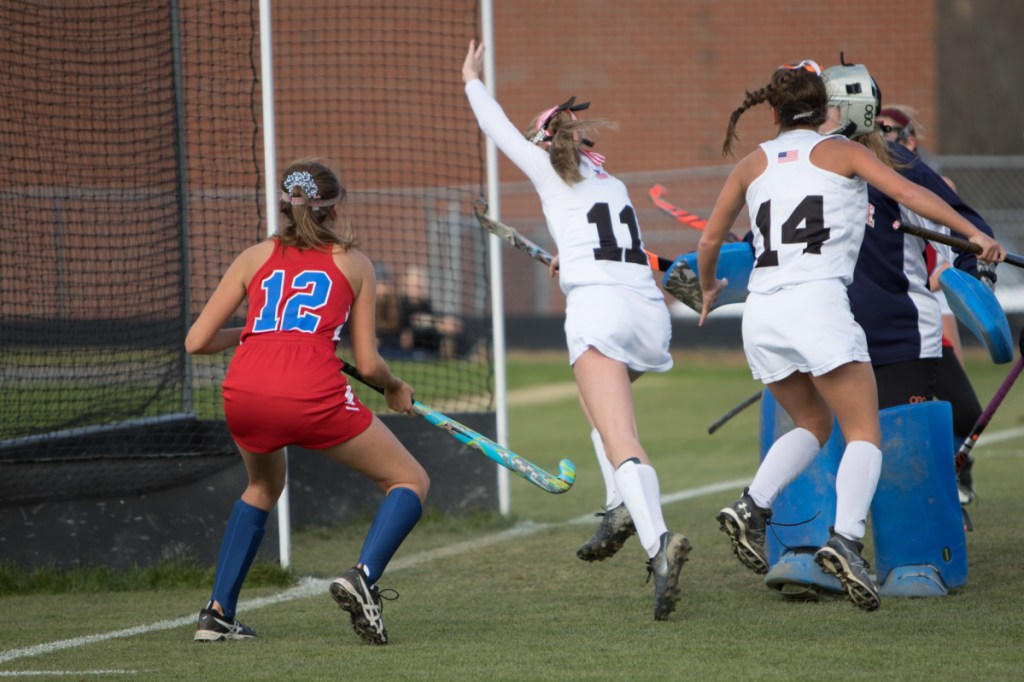 Photo by Jennifer Bechard 
 Skowhegan's Emily Reichenbac (11) reacts after scoring a goal during a Class A North semifinal game against Messalonskee on Saturday in Skowhegan.