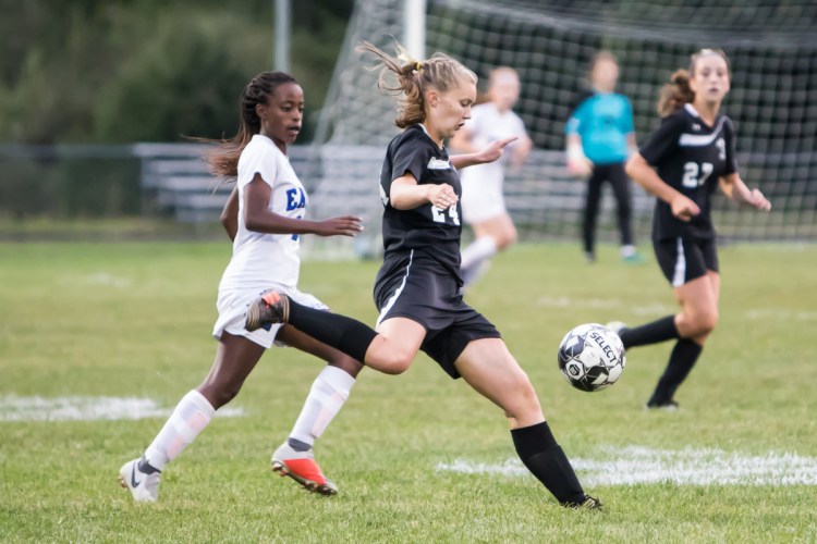 Maranacook's Grace Despres prepares to let go of a shot during a game against Erskine earlier this season.