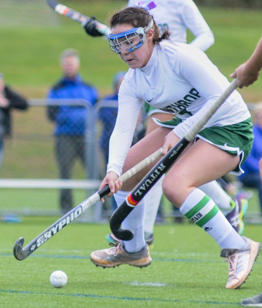 Winthrop's Moriah Hajduk tries to maintain possession of the ball during a Class C North semifinal game Saturday at Kents Hill.