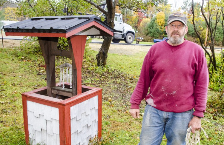 David H. Riddle talks about his well during an interview Wednesday at his Oakland Road home in Belgrade.