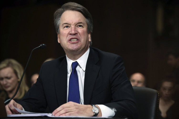 Supreme Court nominee Judge Brett Kavanaugh gives his opening statement before the Senate Judiciary Committee on Capitol Hill in Washington. Kavanaugh is blaming the Clintons for the sexual misconduct allegations against him. In doing so, the judge is drawing new attention to his time on the Kenneth Starr team investigating Bill Clinton's sexual misconduct in the 1990s.
