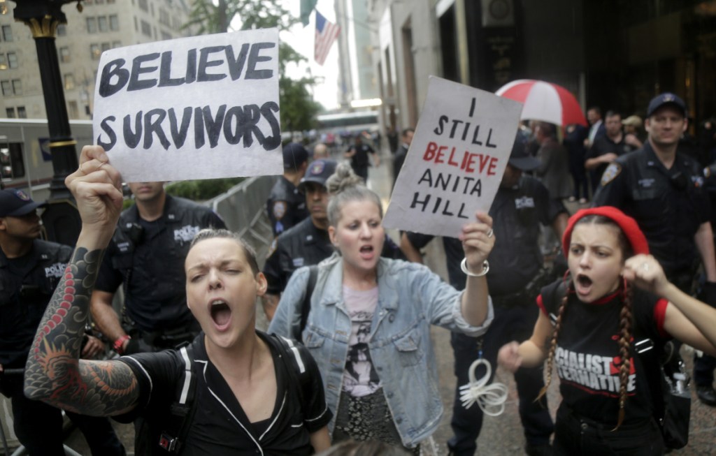 Protesters rally in front of Trump Tower in New York on Thursday against Supreme Court nominee Brett Kavanaugh.