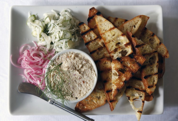 Smoked Trout Pâté with grilled bread and pickled vegetables.