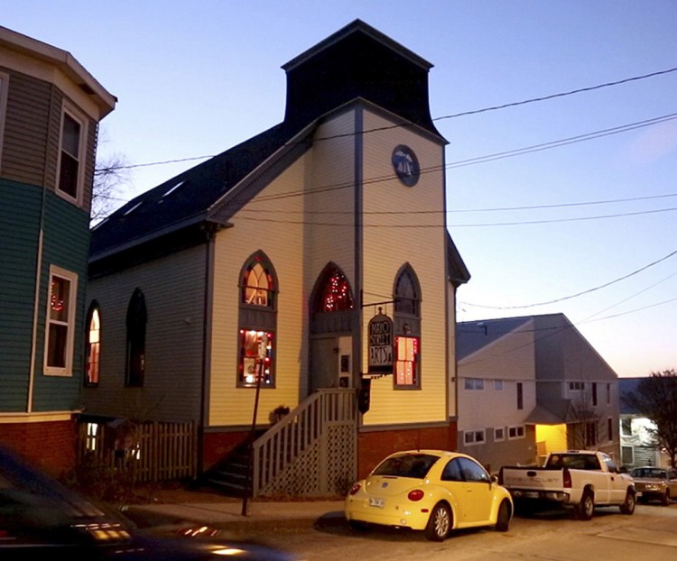 Mayo Street Arts is seen at dusk in 2014 during "Club Hip Hop" an after school program for youth to dance. 
 Staff photo by Gabe Souza