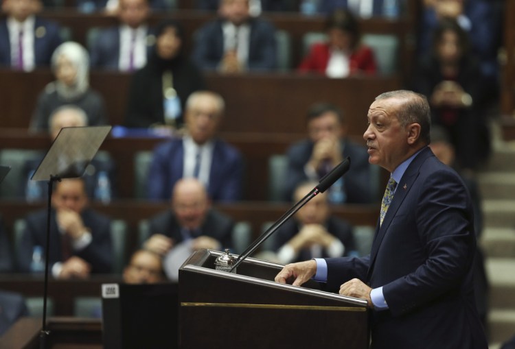 AP Photo/Ali Unal)
Turkey's President Recep Tayyip Erdogan addresses members of his ruling Justice and Development Party, in Ankara, Turkey on Tuesday. Turkey's president says Saudi officials started planning to murder Saudi writer Jamal Khashoggi days before his death in Saudi Arabia's Istanbul consulate.