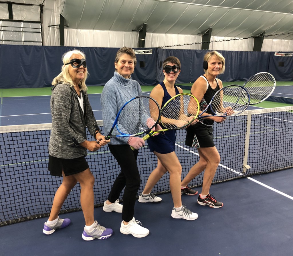 Sporting the eye mask, gloves and ear muff challenge from left were KVTA President Carol Ladd, new KVTA Facility Manager Cindy McInerney, KVTA member Tracey Cahn and Social Committee Chairwoman Lisa Lowrey.