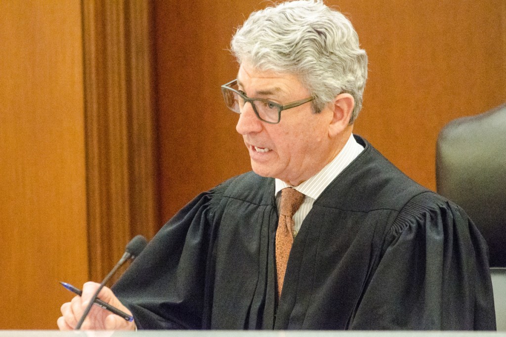 Superior Court Justice William Stokes accepts guilty pleas on two charges from Tyler Goucher on Wednesday at the Capital Judicial Center in Augusta.