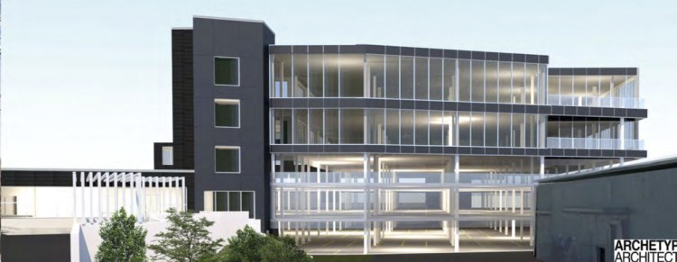 A Planning Board staffer has raised questions about the design of the structure at 100 Fore St.
