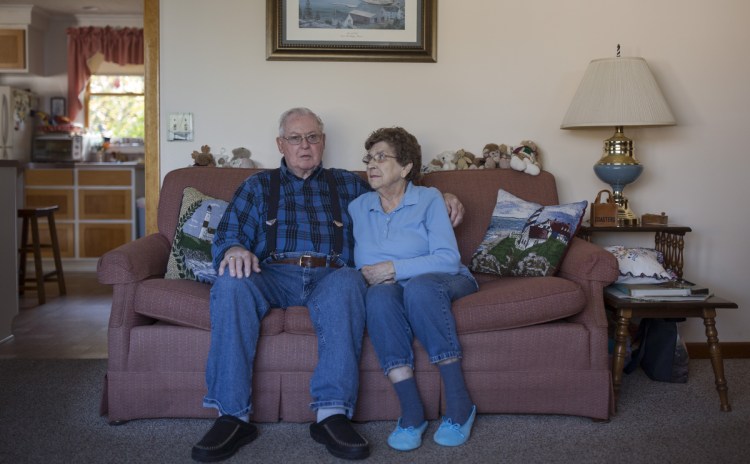 Royall Dodge, 88, a veteran of the Korean War sits with his wife of 66 years, Eleanor Dodge, at his home in East Boothbay. Dodge was in a land mine explosion in Korea and ended up in the hospital for a year and a half. The night the mine blew up, Dodge heard it, but never saw it. Three others died in the blast. Dodge remembers a medic telling him that if he hadn't been wearing a heavy flack jacket, "you wouldn't be here right now."