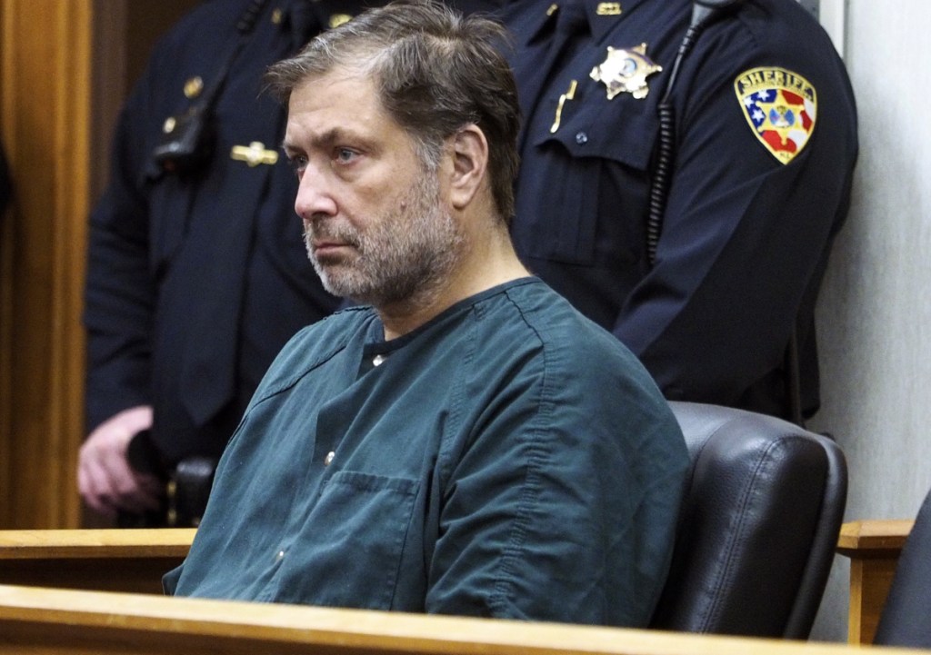 Paul Caneiro appears in Monmouth County Superior Court for a detention hearing on Friday in Freehold, N.J. Caneiro, 51, faces four counts of murder, along with arson and weapons charges, in the deaths of his brother Keith; Keith's wife, Jennifer; their 11-year-old son, Jesse; and their 8-year-old daughter, Sophia.