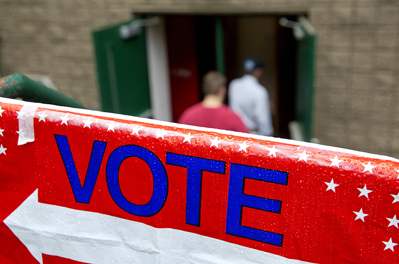 Voters walk in to cast their ballots in Georgia's 6th Congressional District special election at a polling site in Sandy Springs, Ga., Tuesday, June 20, 2017. The most expensive House race in U.S. history heads to voters Tuesday in suburban Atlanta. Either Republican Karen Handel will claim a seat that's been in her party's hands since 1979 or Democrat Jon Ossoff will manage an upset that will rattle Washington ahead of the 2018 midterm elections. (AP Photo/David Goldman)